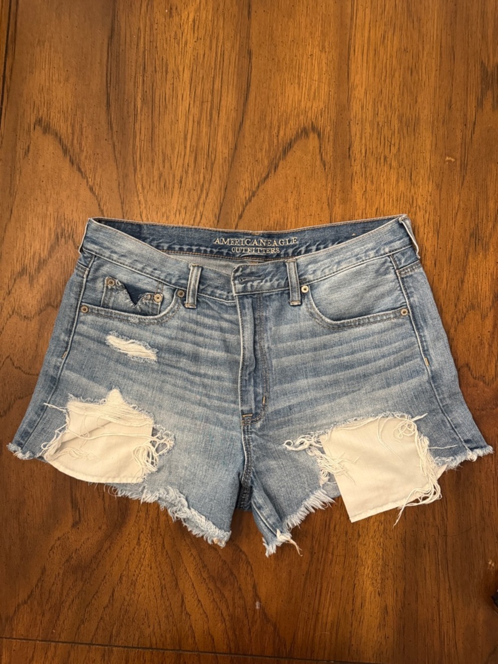 American Eagle Vintage Hi-Rise Festival Light Wash Distressed Denim Shorts